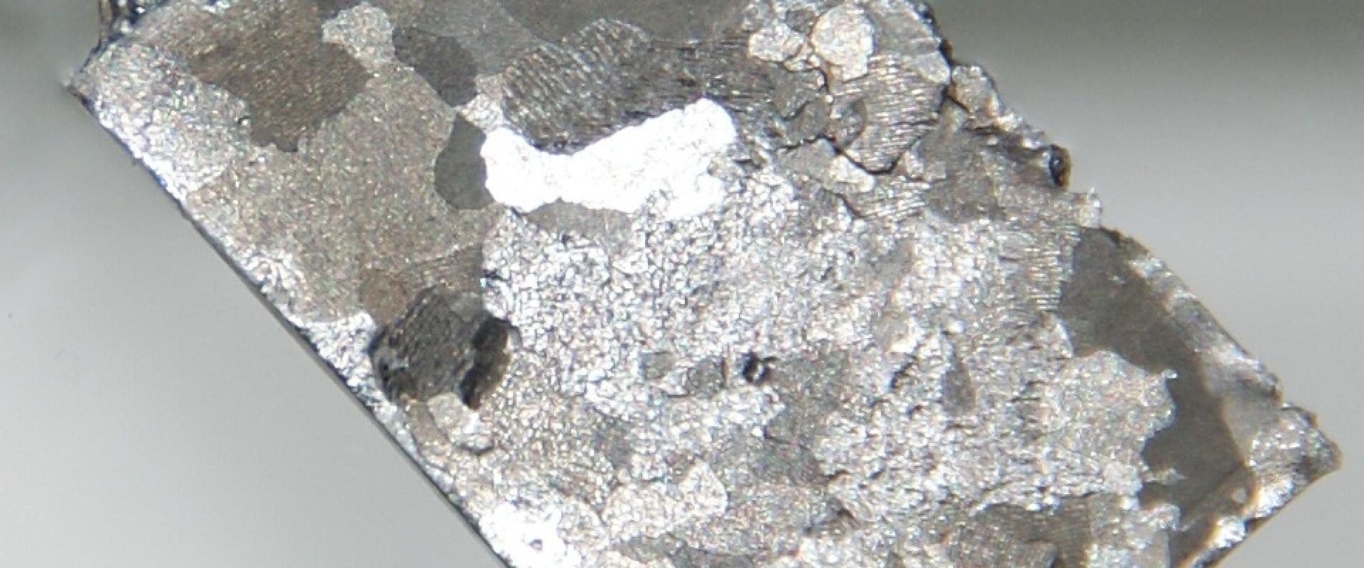 Pure etched ruthenium, 1.8 grams. 